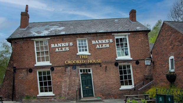 Burned and bulldozed British pub to be rebuilt just as it was — crooked