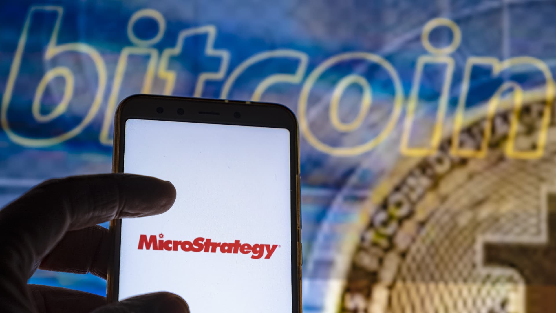 MicroStrategy, largest corporate holder of bitcoin, drops as much as 18%