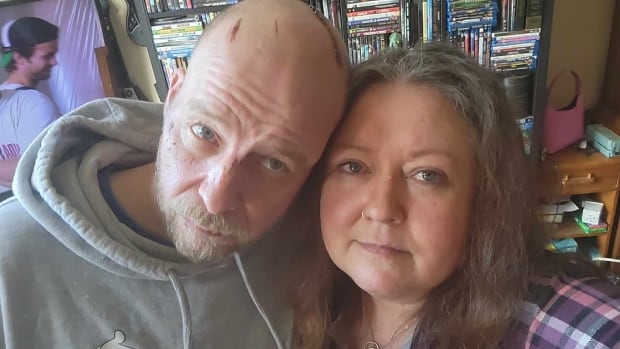 Woman says she had to wait for ER to open as husband had seizure