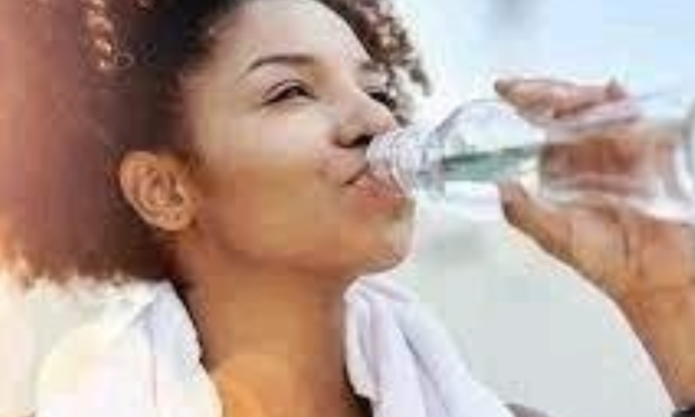 Why is it important to drink at least two glasses of water every morning?