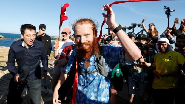 U.K. runner completes 16,000-km odyssey spanning the length of Africa