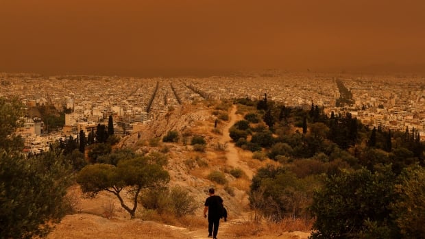 Eerie, orange skies engulf Athens as dust clouds blow in from Africa