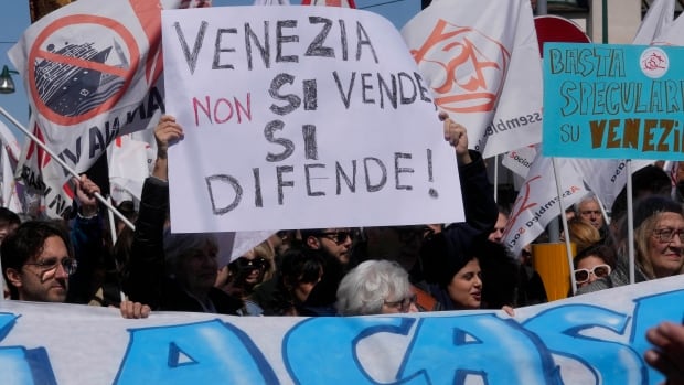 Venice residents protest as new charge on daytrippers kicks in