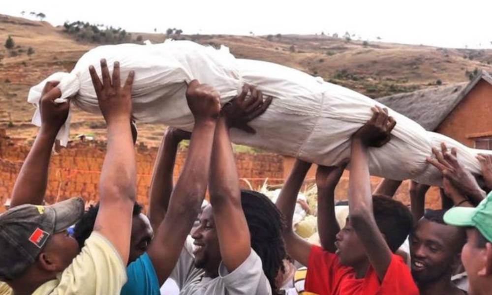 Why people of this country dig up dead bodies to dance and party