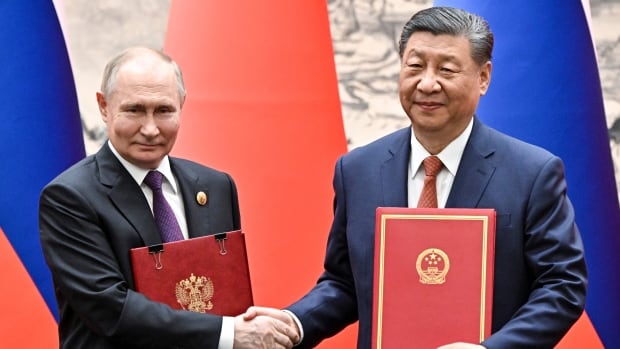 Putin and Xi stress their partnership as Russia pushes in northeastern Ukraine