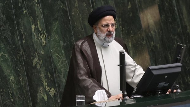 Crashed helicopter carrying Iran’s president found as state media reports ‘no signs of life’ at site