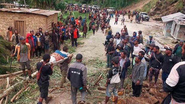 Hundreds feared buried after landslide hits Papua New Guinea