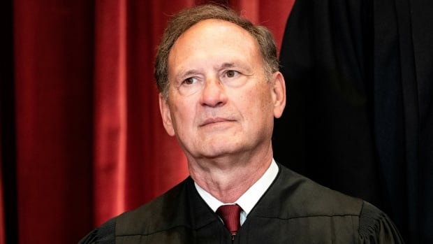U.S. Supreme Court justice Alito blames wife for flying flag associated with Trump election deniers