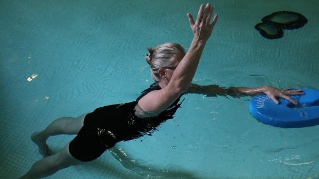 People with back pain often shy away from movement. Getting in the water may help, experts say