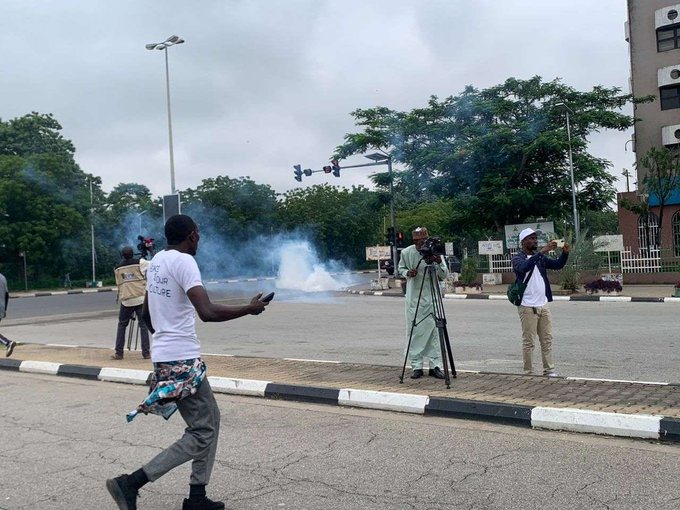 Police fire tear gas at #EndBadGovernanceInNigeria protesters in Kano