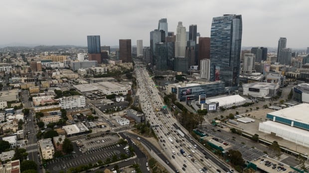 Passenger dies after gunman hijacks city bus in L.A., forces driver through traffic at gunpoint