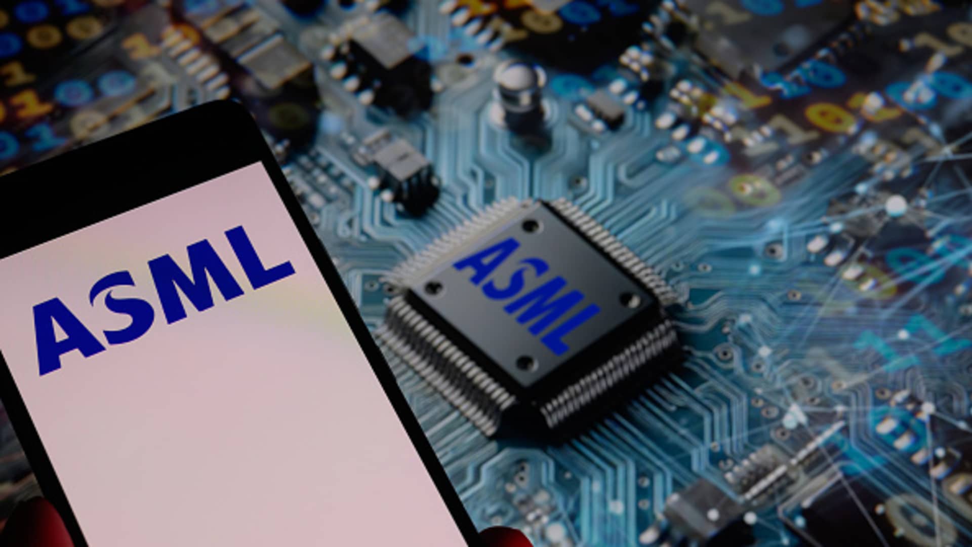 Chip firm ASML shares fall 12% after earnings released earlier than expected