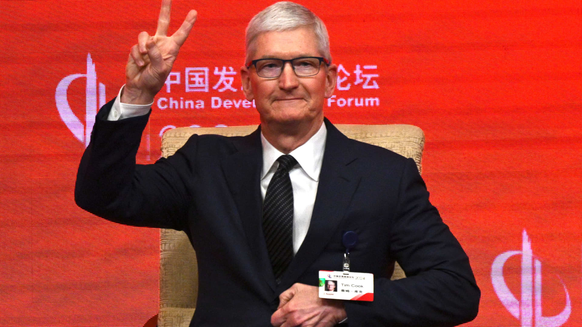 Tim Cook is likely visiting China to bolster support for Apple Intelligence, analysts say