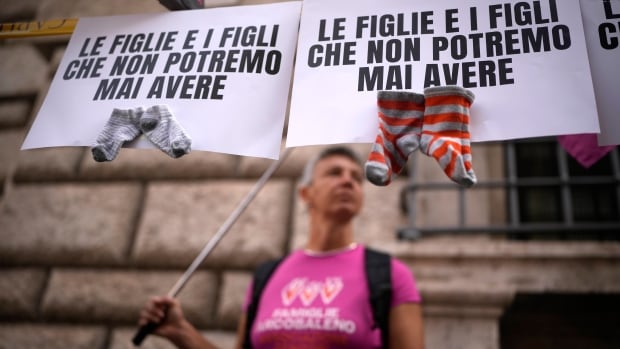 Italy passes law banning surrogacy abroad that activists say targets LGBTQ+ couples