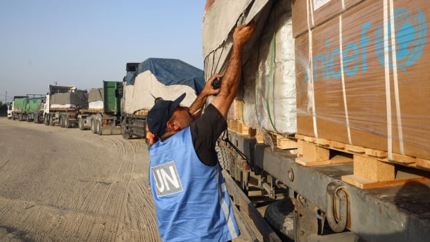 Trucks carrying aid into Gaza are being violently ransacked. Here’s what we know