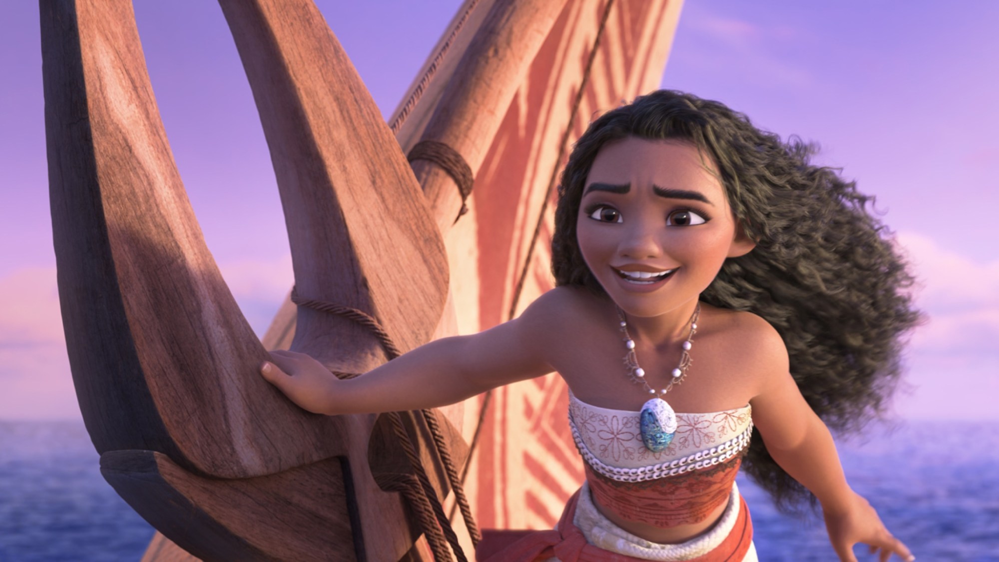 Moana sailing on a boat in Moana 2