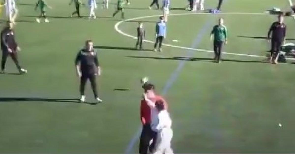 Shocking moment mother storms pitch and slaps referee during under-12 football match | Football