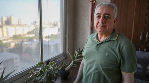 Azerbaijani fossil fuel critic worries he'll be a prisoner in his own home until he dies