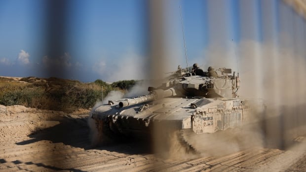 Israeli tanks open fire on central Gaza refugee camp, 11 killed in overnight strikes