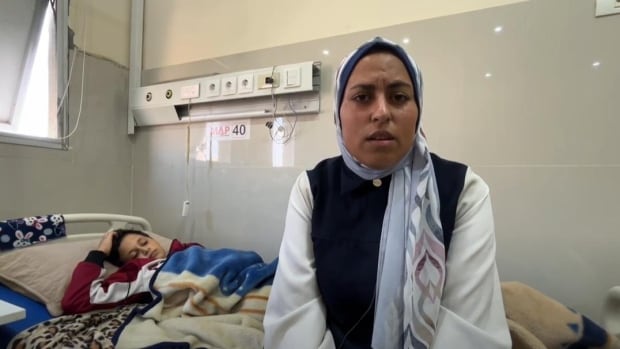 Palestinian paramedic recounts 'massacre' on school shelter in northern Gaza