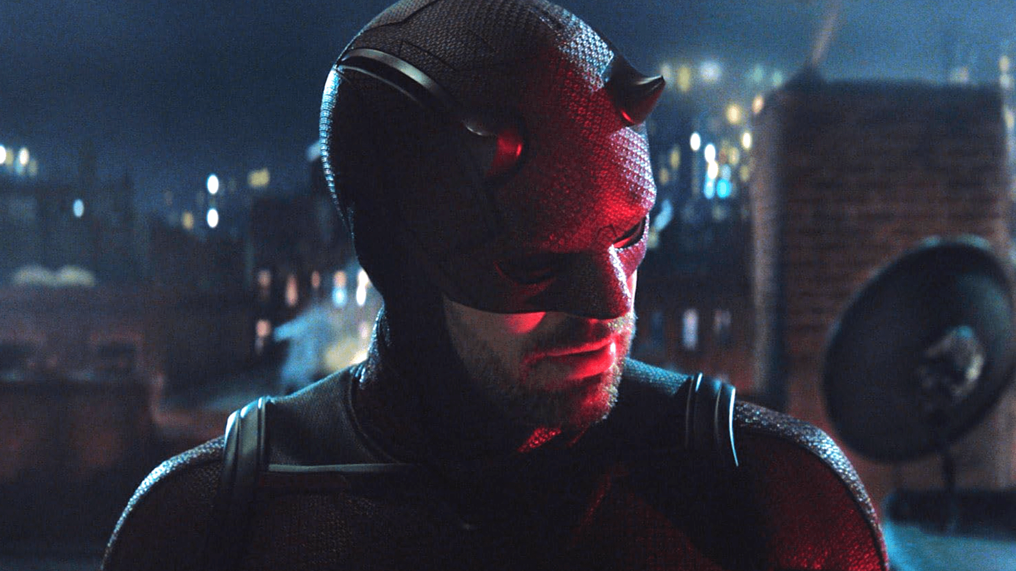 Charlie Cox as Daredevil in red suit and mask