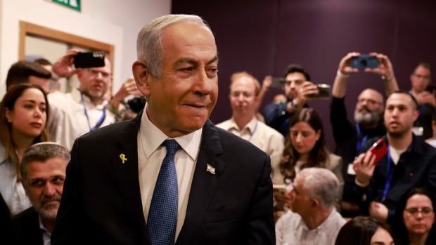 Benjamin Netanyahu begins testifying in his corruption trial, calls charges 'ocean of absurdness'