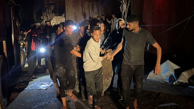 Dozens of Palestinians sheltering in Gaza post office killed in single Israeli strike